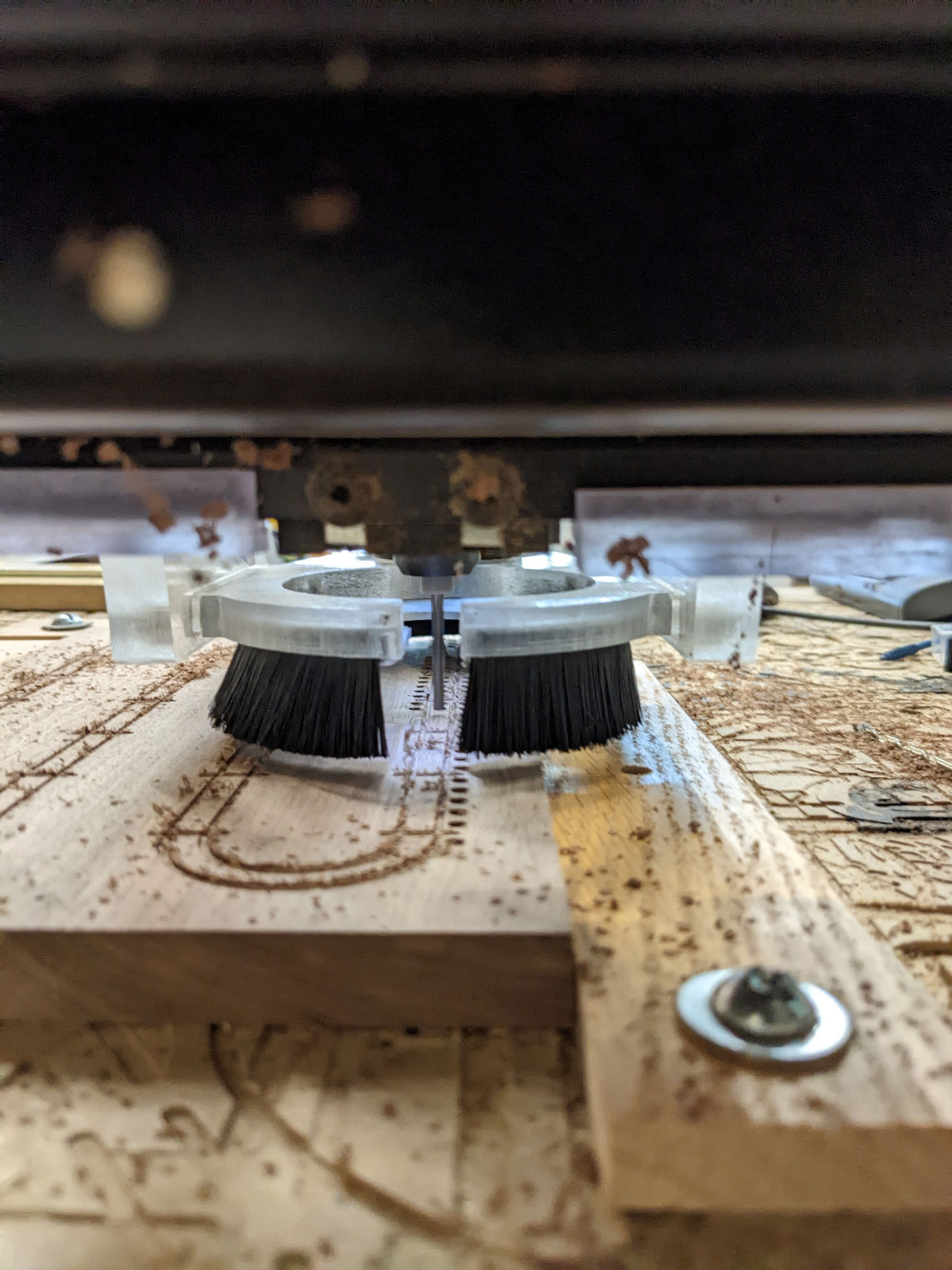 CNC router cutting holes in walnut top